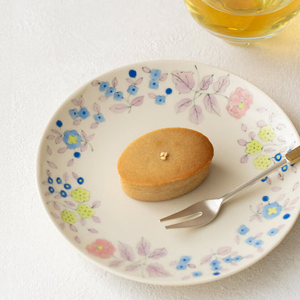 5-inch painted plate with floral arabesque pattern in pink